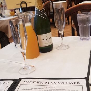 Hidden Manna Cafe - 25 dollar bottle mimosa with your choice of juices - Breakfast & Brunch Near Me - Matteson, Illinois