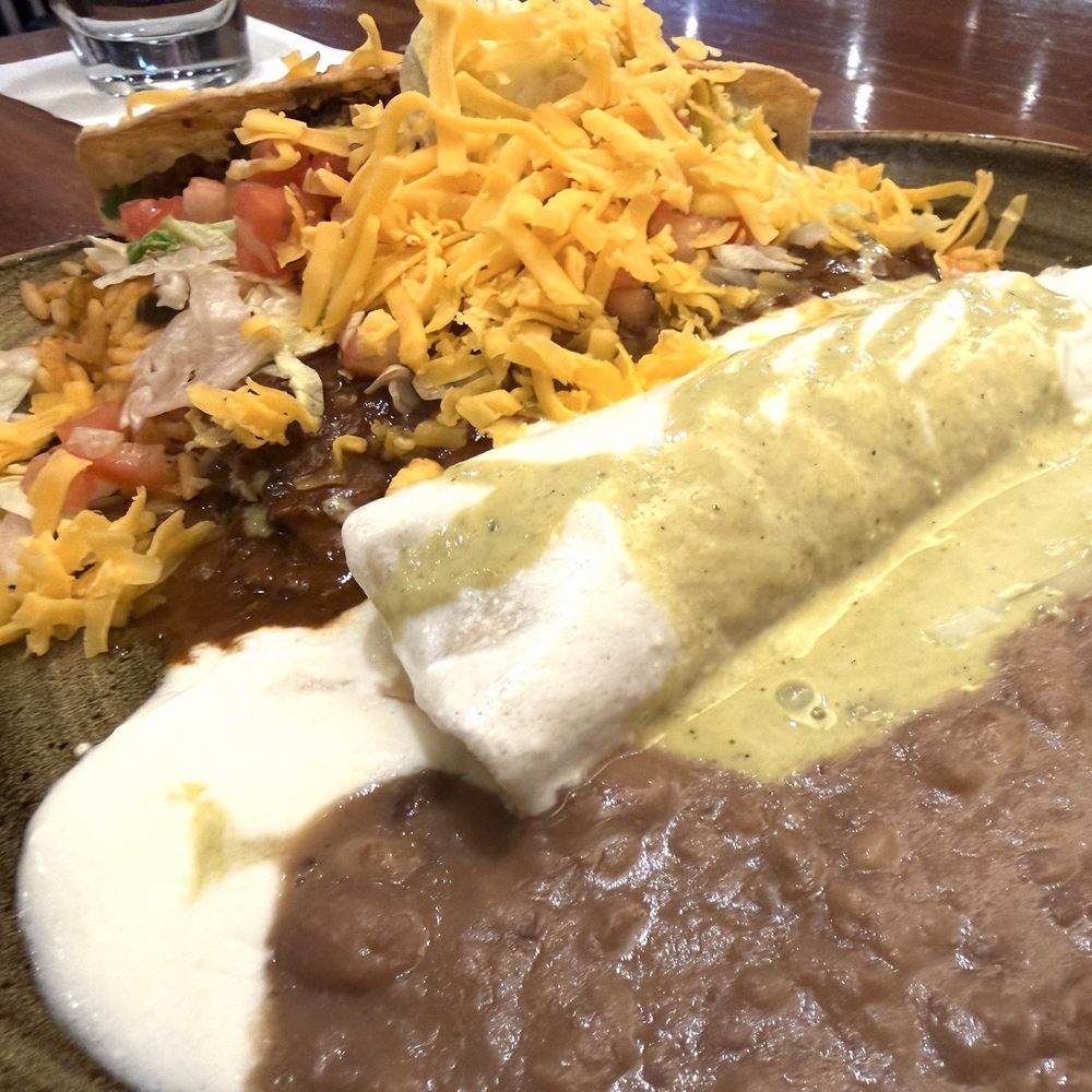 Cantina Laredo - Cancun, colorful, flavor-packed platter featuring a ground sirloin and a tender chicken enchilada with a crispy beef taco for crunch. - Mexican Near Me - Bloomington, Minnesota