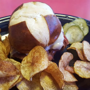 The Local Joint - Pastrami on Pretzel bun with house made chips - Diners Near Me - Fairview, North Carolina