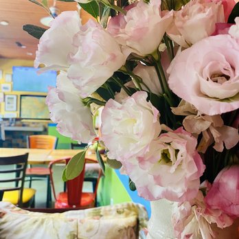 Cafe Brasil - Gorgeous decor all around! These gorgeous flowers were at my table! - Brazilian Near Me - Los Angeles, California Cafe Brasil - Gorgeous decor all around! These gorgeous flowers were at my table! - Brazilian Near Me - Los Angeles, California