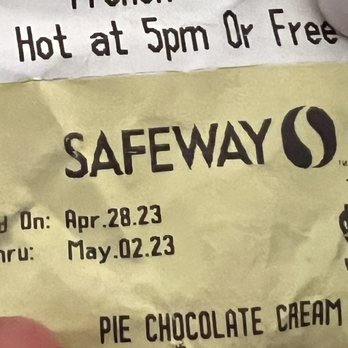 Safeway - a hand holding a paper ticket - Grocery Near Me - Alamo, California