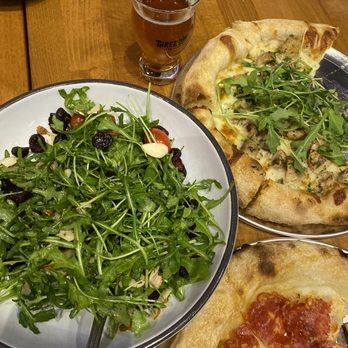 Three Wide Brewing - Arugula salad, mushroom truffle pizza with arugula, and spicy sopressata honey pizza - Breweries Near Me - Northlake, Texas Three Wide Brewing - Arugula salad, mushroom truffle pizza with arugula, and spicy sopressata honey pizza - Breweries Near Me - Northlake, Texas
