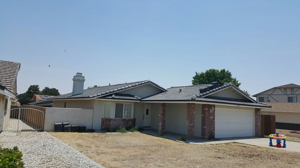 Slide of LAC Roofing