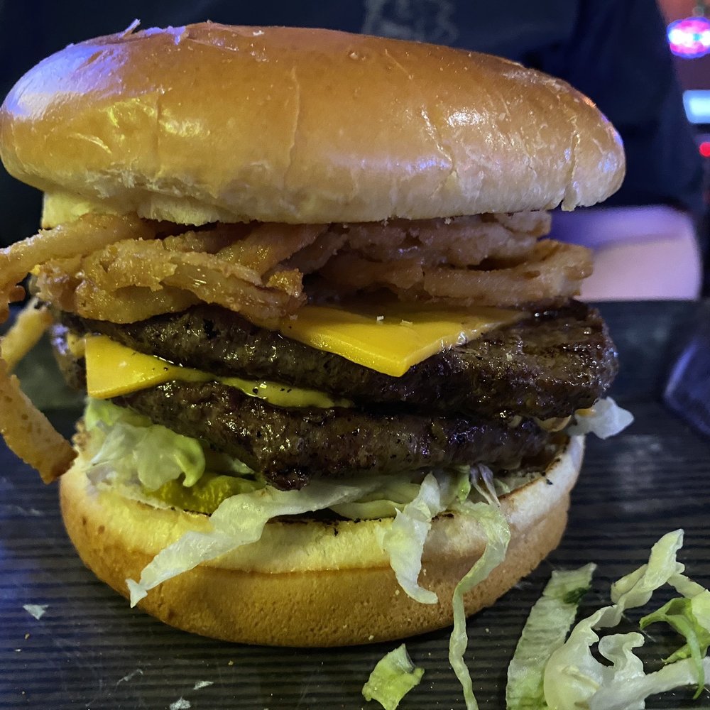 Double cheeseburger with onion straws Double cheeseburger with onion straws