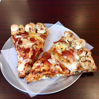 Irvington Pizza Company - Colossal Pizza Slice with Garlic Knot Crust - Pizza Near Me - Irvington, New York Irvington Pizza Company - Colossal Pizza Slice with Garlic Knot Crust - Pizza Near Me - Irvington, New York
