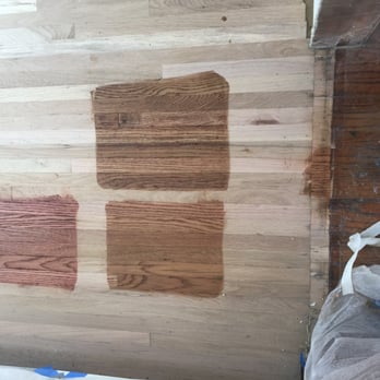 Carter Wood Floors - Workers showed me options to choose from. After picking a color, they sanded the samples off the floor and proceeded to stain the floor. - Flooring Near Me - Long Beach, California