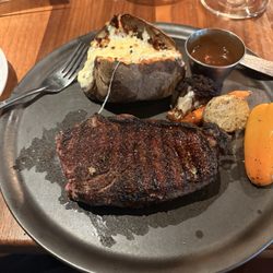 Boefish - New York steak, medium rare with all dressed baked potato