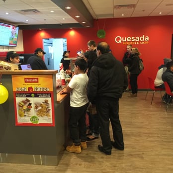 Quesada Burritos & Tacos - customers at the counter - Mexican Near Me - Hamilton, Ontario Quesada Burritos & Tacos - customers at the counter - Mexican Near Me - Hamilton, Ontario