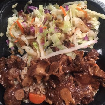 Fiery Irie Jamaican Restaurant - Large oxtail with sides. - Caribbean Near Me - Pembroke Pines, Florida Fiery Irie Jamaican Restaurant - Large oxtail with sides. - Caribbean Near Me - Pembroke Pines, Florida