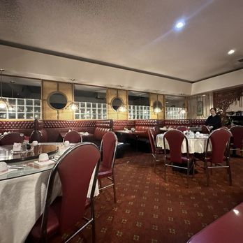 Peking House - dining room with red booths and tables - Chinese Near Me - Shoreline, Washington Peking House - dining room with red booths and tables - Chinese Near Me - Shoreline, Washington