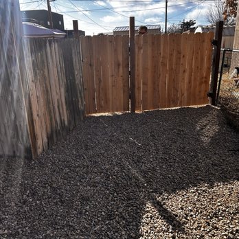 Henry’s Tree Experience - Driveway clean-up with Gravel install. Installed a walkway fence as well as a driveway gate. This gate has two doors. - Landscape Architects or Designers Near Me