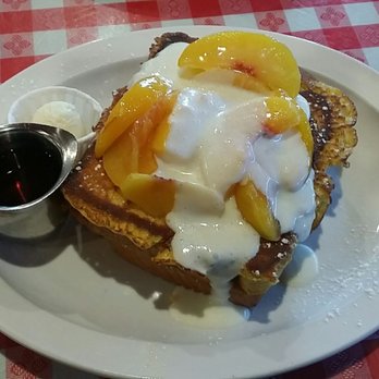 Mo's Egg House - French toast stuffed with a peach cream cheese filling and topped off with fresh peaches and yummy sweet cream was so good!! - Breakfast & Brunch Near Me - Temecula, California