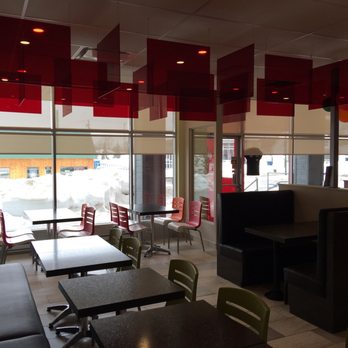 Fritou Loretteville - tables and chairs in a restaurant - Burgers Near Me - Quebec City, Quebec Fritou Loretteville - tables and chairs in a restaurant - Burgers Near Me - Quebec City, Quebec