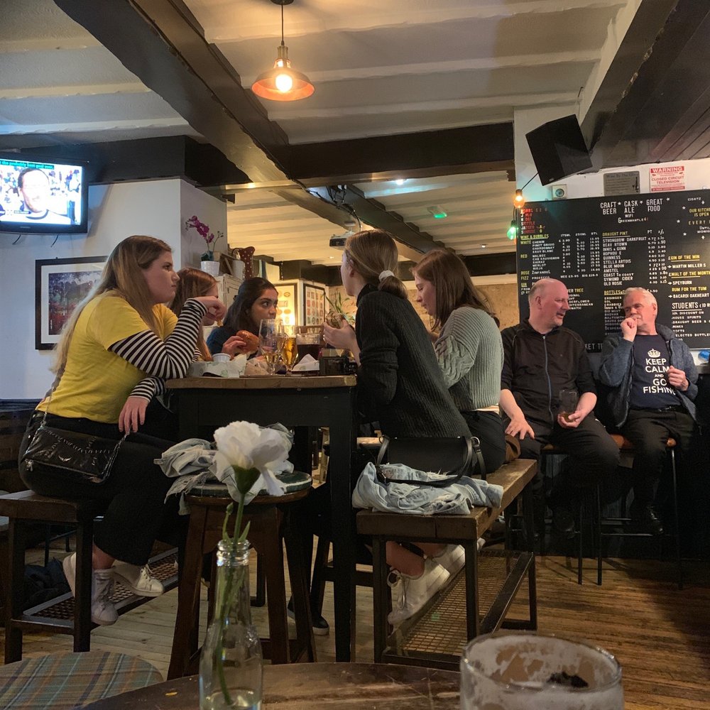 The Green Mantle - A respectable cross section of generations. And a glimpse of the drinks menu. - Pubs Near Me - Edinburgh, EDH The Green Mantle - A respectable cross section of generations. And a glimpse of the drinks menu. - Pubs Near Me - Edinburgh, EDH
