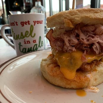 Denver Biscuit Co. - Broadway - Chicken cordon bleu biscuit with my coffee!! Notice it's the height of the MUG!!! - Breakfast & Brunch Near Me - Denver, Colorado Denver Biscuit Co. - Broadway - Chicken cordon bleu biscuit with my coffee!! Notice it's the height of the MUG!!! - Breakfast & Brunch Near Me - Denver, Colorado