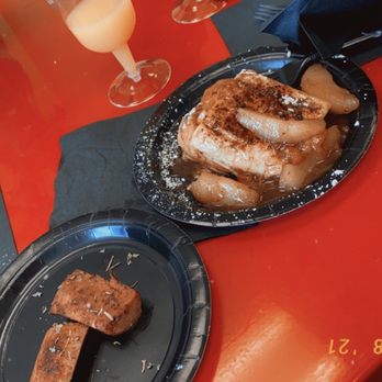 Bite Creole Kitchen - a plate of french toast and a glass of orange juice - Cajun/Creole Near Me - South Euclid, Ohio