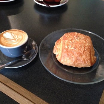 Metropolis Coffee - Cortado and almond croissant. - Coffee & Tea Near Me - Denver, Colorado Metropolis Coffee - Cortado and almond croissant. - Coffee & Tea Near Me - Denver, Colorado