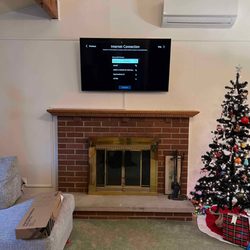 Total Home Entertainment - Mounted tv with wire cover
