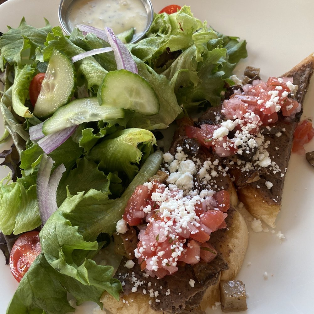 1833 Kitchen and Bar - Mediterranean black bean hummus toast with greens - American Near Me - Aurora, New York 1833 Kitchen and Bar - Mediterranean black bean hummus toast with greens - American Near Me - Aurora, New York