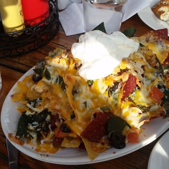 Old Schoolhouse Brewery - The Nachos and a pretzel in the background. - Breweries Near Me - Winthrop, Washington Old Schoolhouse Brewery - The Nachos and a pretzel in the background. - Breweries Near Me - Winthrop, Washington