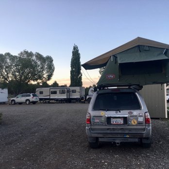Junipers Lake RV Resort - Picnic area to the left, with new barbecue. - RV Parks Near Me - Lakeview, Oregon