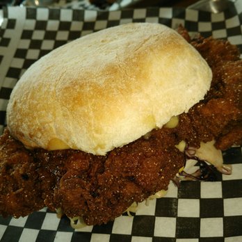 Knuckle Sandwich - Fried chicken patty is tender and juicy with a crispy, crunchy batter. - Poutineries Near Me - Toronto, Ontario