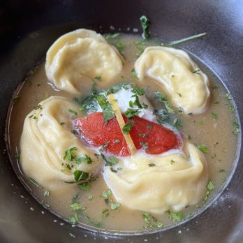 Hampton Winds - a bowl of soup with dumplings and tomatoes - New American Near Me - Bethlehem, Pennsylvania