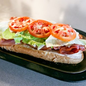 Sherry Lee's Bar and Grill - a sandwich with tomatoes and lettuce - Pizza Near Me - Vandalia, Michigan Sherry Lee's Bar and Grill - a sandwich with tomatoes and lettuce - Pizza Near Me - Vandalia, Michigan