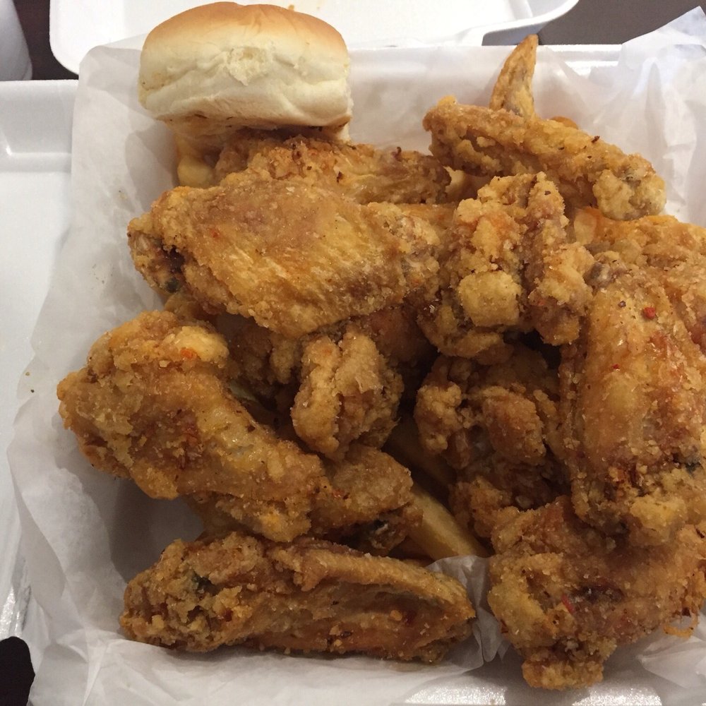 BNB Arcade - a tray of fried chicken and a roll - New American Near Me - Beaumont, Texas
