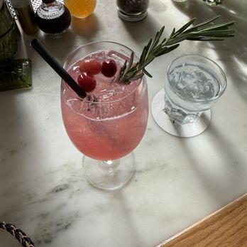 Rose Tavern - Cranberry, rosemary, lemon spritz (with Prosecco) - Wine Bars Near Me - Canandaigua, New York Rose Tavern - Cranberry, rosemary, lemon spritz (with Prosecco) - Wine Bars Near Me - Canandaigua, New York