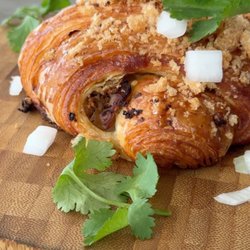 Izola - IZOLA Carnitas Croissant: 
A tribute to the flavors of Mexico and a warm thank-you to the flavors that inspire us from across the border.
