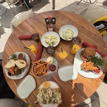 Marelle - Salmon club, fish tacos with fries, burger, Caesar salad - New American Near Me - Santa Monica, California