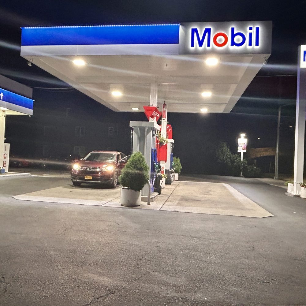 Mobil - a car at a gas station at night - Convenience Stores Near Me - Peekskill, New York
