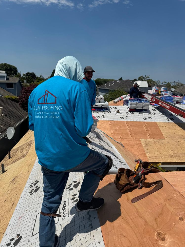 Slide of ELM Roofing Contractors