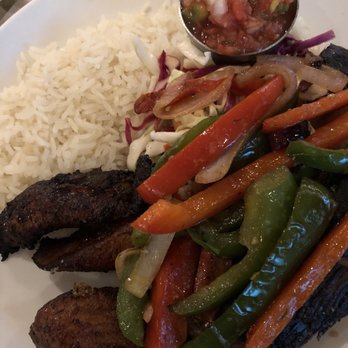Ceviche's - One word - AMAZING. Steak with peppers and coconut rice. - Seafood Near Me - Wilmington, North Carolina Ceviche's - One word - AMAZING. Steak with peppers and coconut rice. - Seafood Near Me - Wilmington, North Carolina