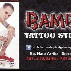 Bambu - the tattoo artist / owner .