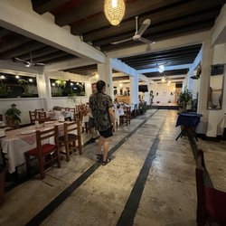 Santos Mariscos Seefood - Interior is open and breezy with fans.
