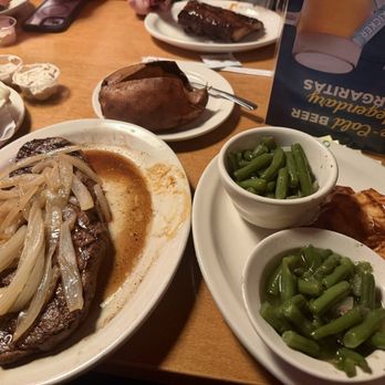 Texas Roadhouse - 16oz sirloin (with onions),  BBQ chicken. Breast, 2 orders of green beans, and a baked sweet potato with cinnamon. - Steakhouses Near Me - Slidell, Louisiana