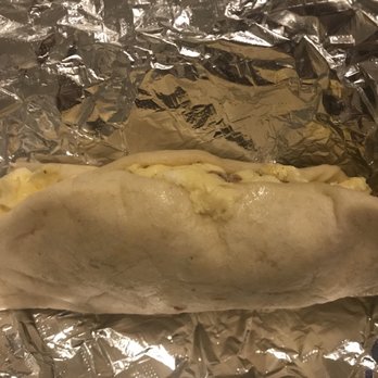 El Charro Amigo #2 - Bacon and egg taco--not huge, but cooked perfectly & stuffed to the gills in a good tortilla. - Breakfast & Brunch Near Me El Charro Amigo #2 - Bacon and egg taco--not huge, but cooked perfectly & stuffed to the gills in a good tortilla. - Breakfast & Brunch Near Me