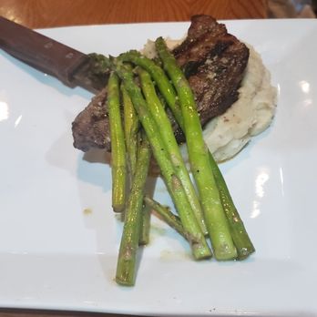 Clever Monkey Craft Grill & Bar - Pork ribery with asparagus and risotto. Delicious! - New American Near Me - Osprey, Florida Clever Monkey Craft Grill & Bar - Pork ribery with asparagus and risotto. Delicious! - New American Near Me - Osprey, Florida