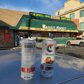 Harvest Market - two cans of orange juice on a car roof - Beer, Wine & Spirits Near Me - Van Nuys, California Harvest Market - two cans of orange juice on a car roof - Beer, Wine & Spirits Near Me - Van Nuys, California