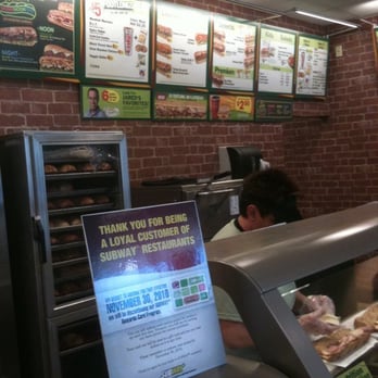 Subway - a man ordering food at a subway restaurant - Sandwiches Near Me - Bonifay, Florida