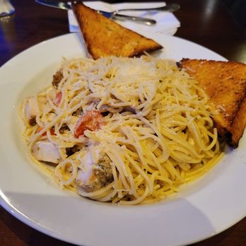The Alley - Chicken alfredo pasta with garlic bread. - Gay Bars Near Me - Boston, Massachusetts
