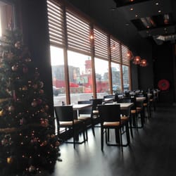 Encore Bar & Grill - Uitzicht op de wijnhaven met lichtschip De Vessel
