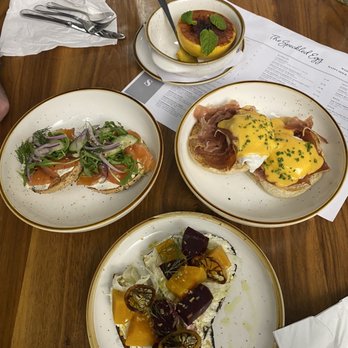 The Speckled Egg PGH - "Lox'd and Loaded" toast and the "You Gotta Ricotta" toast with eggs benedict and a maple sugar and mint grapefruit - Breakfast & Brunch Near Me - Pittsburgh, Pennsylvania The Speckled Egg PGH - "Lox'd and Loaded" toast and the "You Gotta Ricotta" toast with eggs benedict and a maple sugar and mint grapefruit - Breakfast & Brunch Near Me - Pittsburgh, Pennsylvania