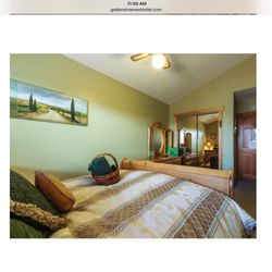 Golden Dreams Bed & Breakfast - Bedside view in Rainforest Room.