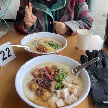 Secret Congee - Pork belly in the foreground and scallop in the background. Both were delicious - Asian Fusion Near Me - Seattle, Washington Secret Congee - Pork belly in the foreground and scallop in the background. Both were delicious - Asian Fusion Near Me - Seattle, Washington