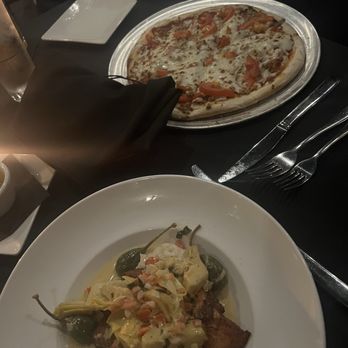 Bellini's Ristorante & Bar - Mediterranean chicken and a sausage pizza - Steakhouses Near Me - Birmingham, Alabama Bellini's Ristorante & Bar - Mediterranean chicken and a sausage pizza - Steakhouses Near Me - Birmingham, Alabama