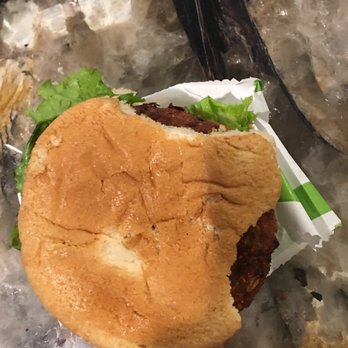 BurgerFi - Quinoa burger, partially eaten bun - Burgers Near Me - Windermere, Florida BurgerFi - Quinoa burger, partially eaten bun - Burgers Near Me - Windermere, Florida