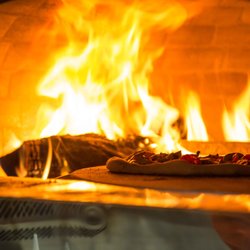 Pomodorino Wood Fired Pizza & Pasta - Our wood fired oven.Pizza time!